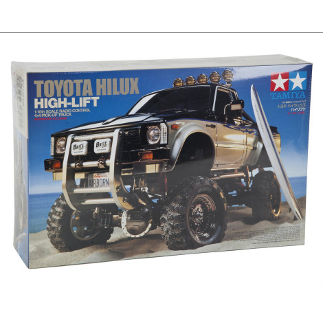 Tamiya Toyota Hilux High-Lift Electric 4X4 Scale Truck Kit w/3-Speed & Surfboard Tamiya Toyota Hilux High-Lift Electric 4X4 Scale Truck Kit w/3-Speed & Surfboard
